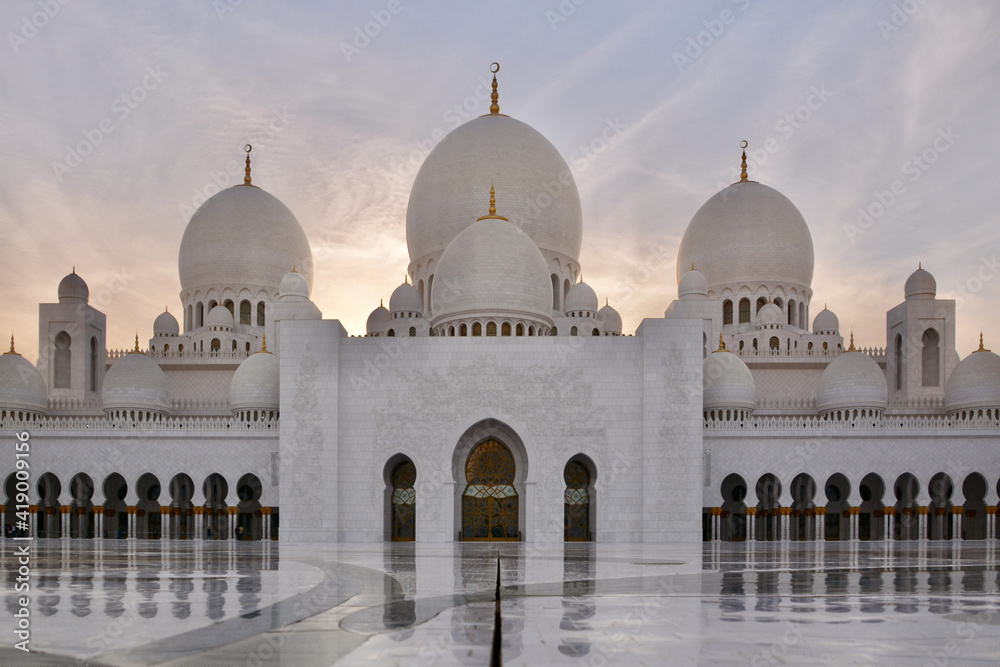 Sheikh Zayed Mosque against the sunset sky. Inside view