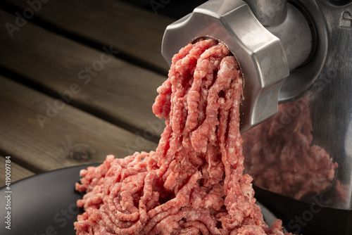 Mincer with fresh minced meat. Healthy homemade food