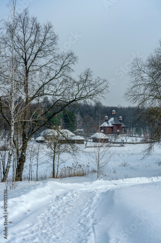 Winter path to church  Ukrainian village
