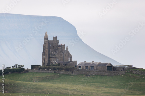 Famous Classiebawn Castle with Belbulbin mountain at the background in Sligo, Ireland. photo