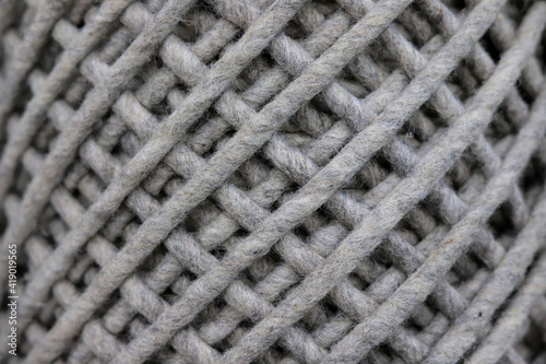 Gray woolen weave fiber fabric close-up