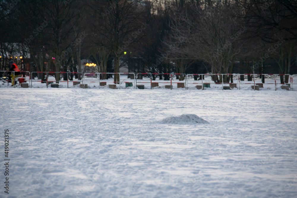 Snow landscape covered with foot prints in Berlin Germany 2021 Snow landscape covered with foot prints in Berlin Germany 2021