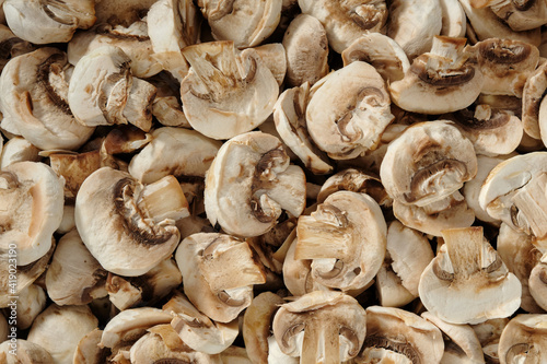 Champignon slices, top view. Background of champignon mushrooms.