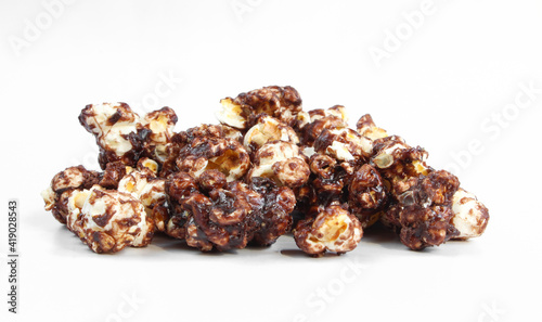 Group of chocolate popcorn isolated on white background. Delicious dessert