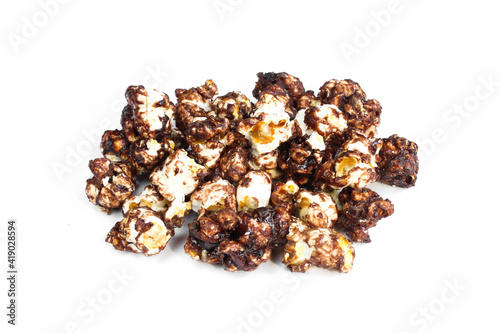 Group of chocolate popcorn isolated on white background. Delicious dessert