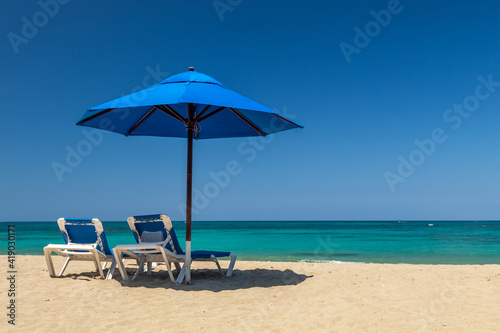 Umbrella and chairs at the beach