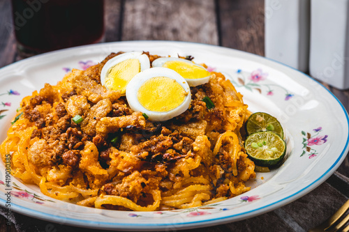 Pancit Malabon (Profile) is a Filipino dish that is a type of pancit, or stir-fried noodle dish, which originated in Malabon, a city in the Philippines. photo