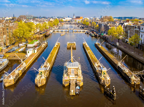 Canvas Print Skinny bridge in the morning in Amsterdam, Netherlands