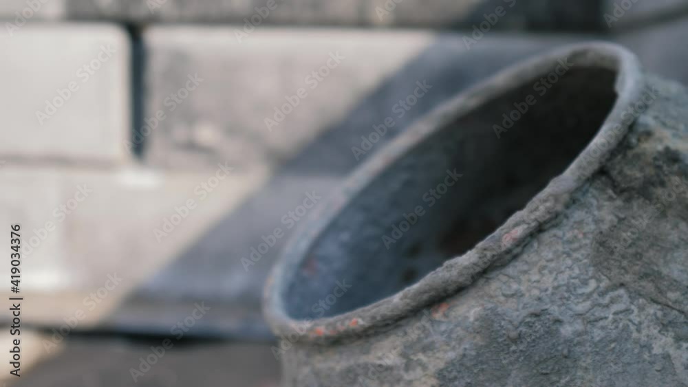 Industrial cement mixer machine a construction site. concept building lifestyle constructing architect concrete pouring. Mixes sand, gravel and water Industrial cement mixer machine a construction site. concept building lifestyle constructing architect concrete pouring. Mixes sand, gravel and water