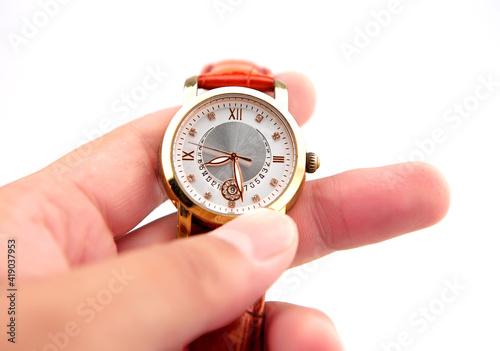Wrist watch in hand