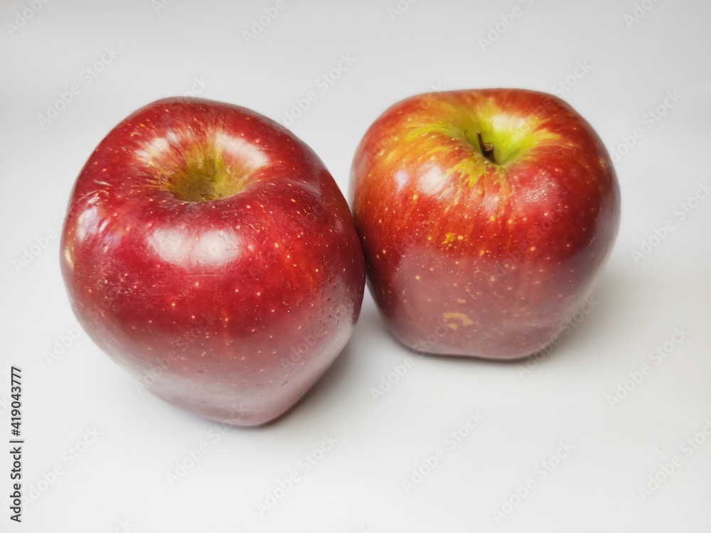 Red Apples Isolated on White Background. Blurry Background Red Apples Isolated on White Background. Blurry Background