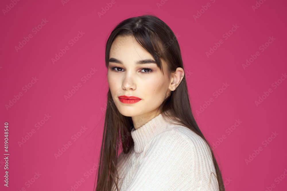 Woman with long hair and red lips white blouse pink background attractive look Woman with long hair and red lips white blouse pink background attractive look