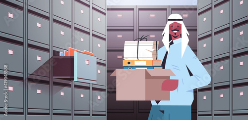 arab businessman holding cardboard box with documents in filing wall cabinet with open drawer data archive storage business administration paper work concept horizontal portrait vector illustration
