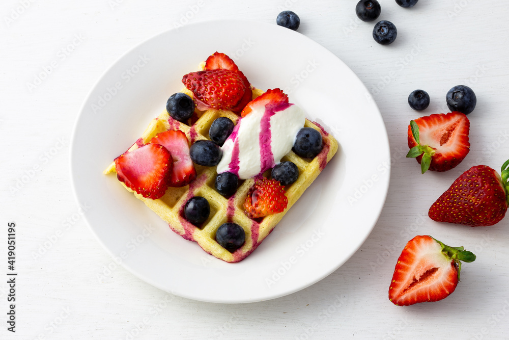Waffles, strawberries, blueberries with yogurt Waffles, strawberries, blueberries with yogurt