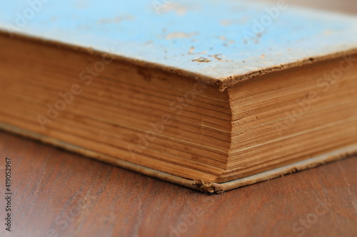 Really old book on wooden floor
