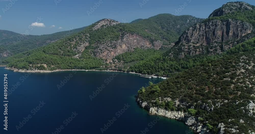Tropical beach aerial view, Top view of waves break on tropical sand mountain Tropical beach aerial view, Top view of waves break on tropical sand mountain