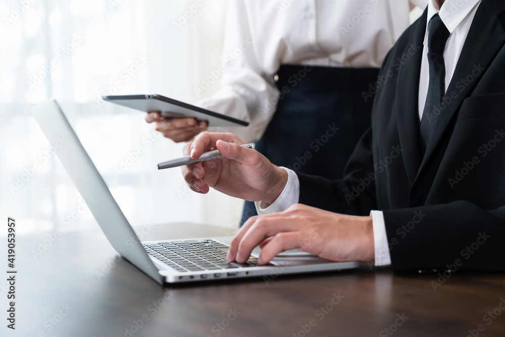business people holding tablet and smartphone with meeting and brainstorming in planning work. business people holding tablet and smartphone with meeting and brainstorming in planning work.