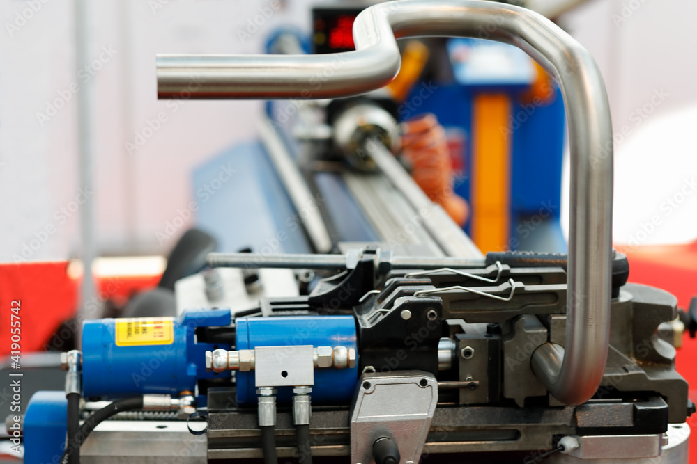 industrial CNC pipe bending machine close up industrial CNC pipe bending machine close up