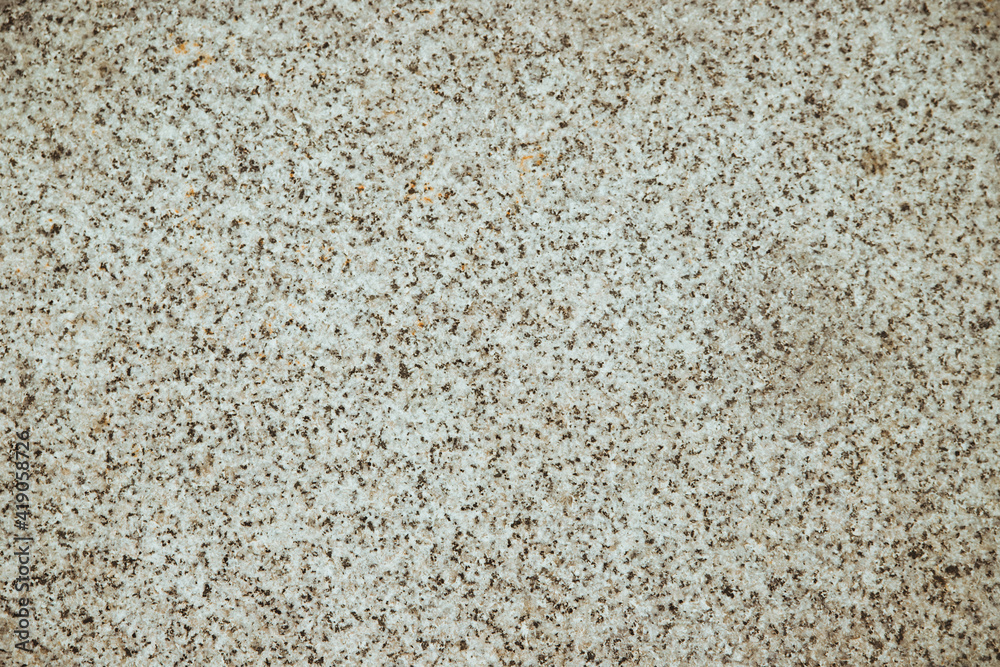 The texture of marble. The stone floor is made of gray marble chips. The texture of marble. The stone floor is made of gray marble chips.