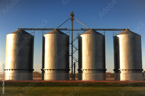 Steel and chrome industrial grain silo photo