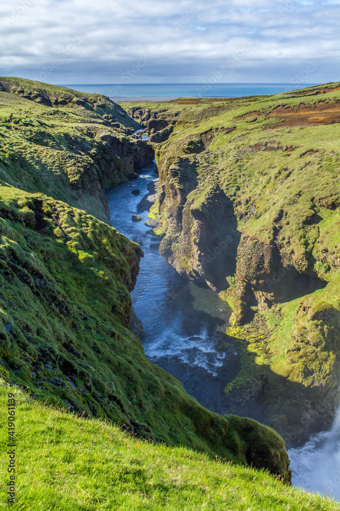 Deep canyon of Skogarfoss river at the Fimmvoerduhals hiking trail, Iceland Deep canyon of Skogarfoss river at the Fimmvoerduhals hiking trail, Iceland