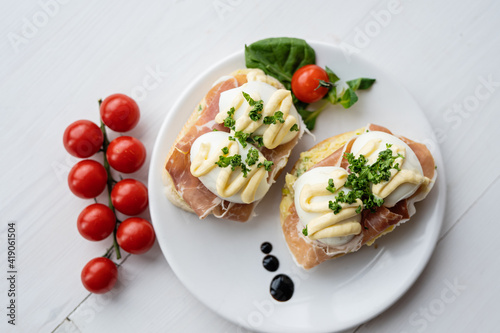 prosciutto dry hure ham with egg mayo dressing open bread sandwich with salad vegetables finger party food  photo