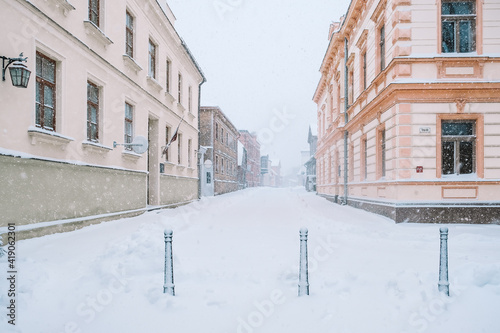 Snowy street in the historical center of Cesis, Latvia. Selective focus