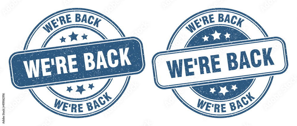 Fototapeta premium we're back stamp. we're back label. round grunge sign