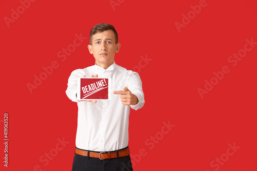 Young man with tablet compu...
