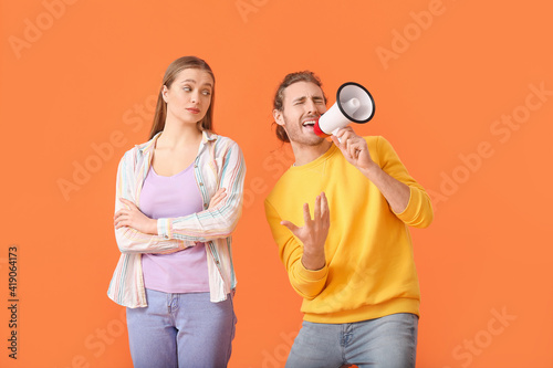 Emotional young couple with...