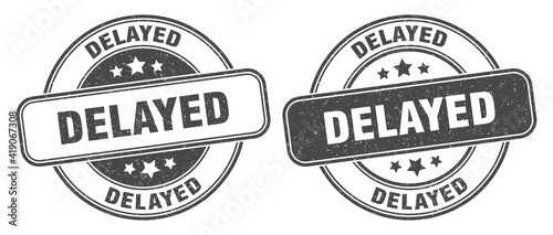 delayed stamp. delayed label. round grunge sign