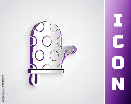 Paper cut Oven glove icon isolated on black on purple background. Kitchen potholder sign. Cooking glove. Paper art style. Vector.