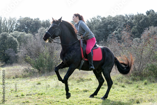 riding girl and horse