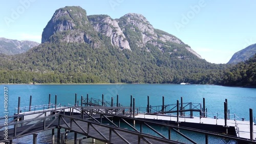 Pan shot at the shore of Puerto Blest with Nahuel Huapi Lake and the mountains in the background