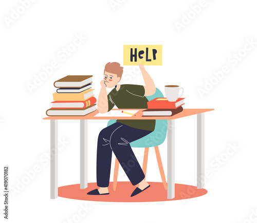 Little boy overwhelmed with homework sitting sad at school desk with books and textbooks