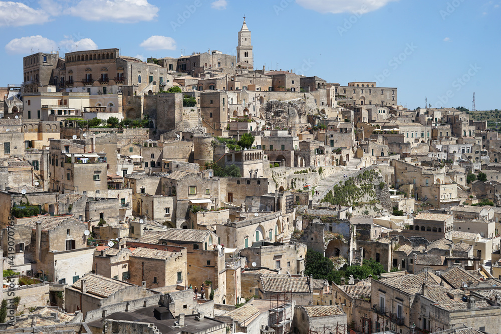 Matera historic site aerial panoramic cityscape with ancient cave dwellings popular tourist travel place, guided tour concept, Basilicata, Italy