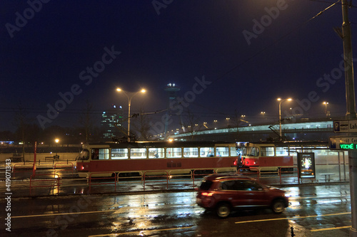 Night tram at rainy Bratislava street