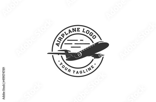 airplane logo with an illustration of an airplane in flight