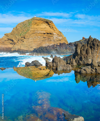 Ocean bathes lava pools Mad...