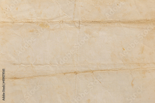 Recycled crumpled brown paper texture or paper background for design with copy space for text or image