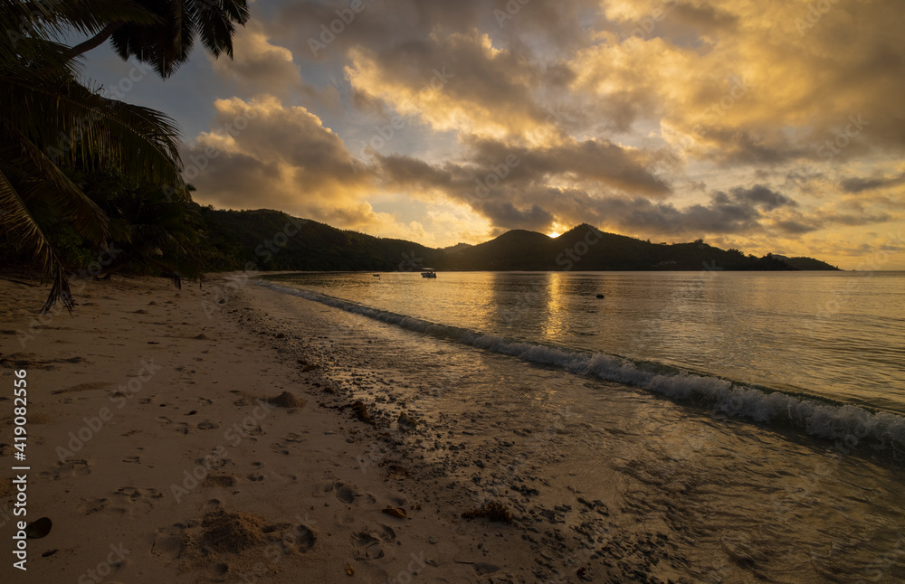 Sunrise view of Baie Lazare beach on Mahe Island in the Seychelles Sunrise view of Baie Lazare beach on Mahe Island in the Seychelles