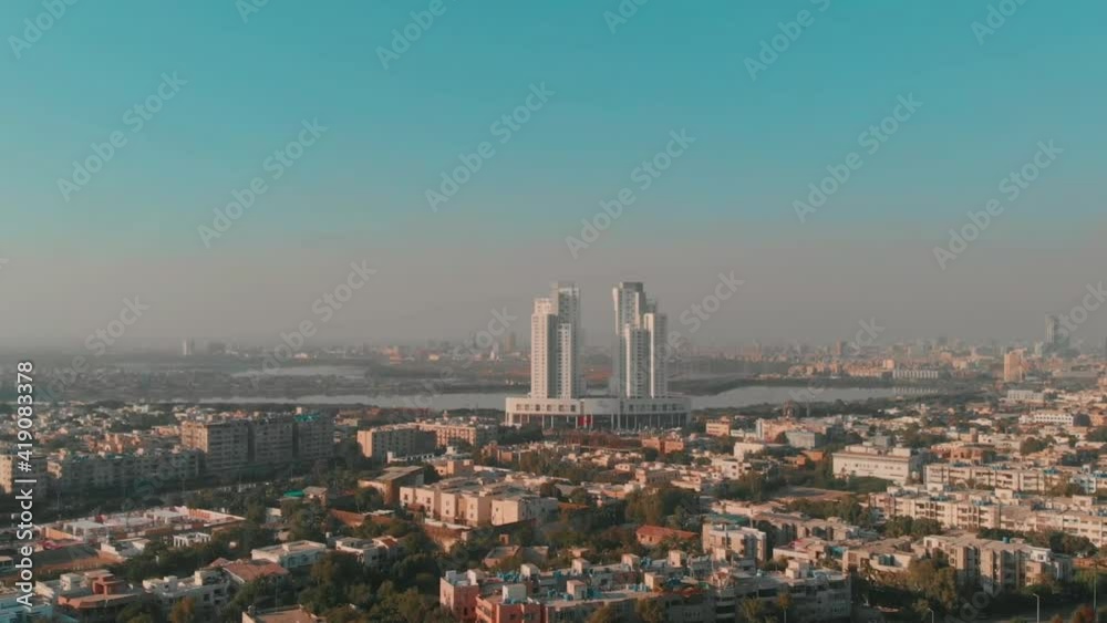 Com3 Mall Apartment Complex Seen In Distance In Karachi Pakistan. Aerial Dolly Forward Com3 Mall Apartment Complex Seen In Distance In Karachi Pakistan. Aerial Dolly Forward