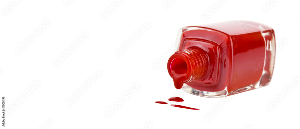 Bottle with red nail polish products isolated on white background close up. Bottle with red nail polish products isolated on white background close up.