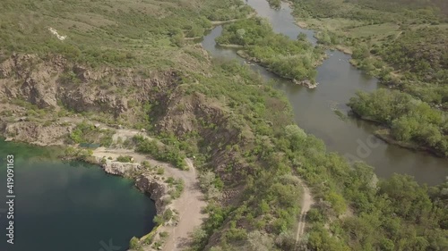 Aerial view to Radon Lake in place of flooded granite quarry near Southern Bug river, Mihiia village, Ukraine. Famous place for rest photo