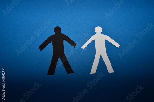 black and white figure  on a blue background