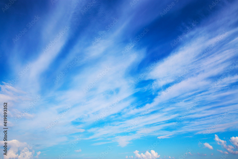 The puffy white cloud in the blue sky. The puffy white cloud in the blue sky.