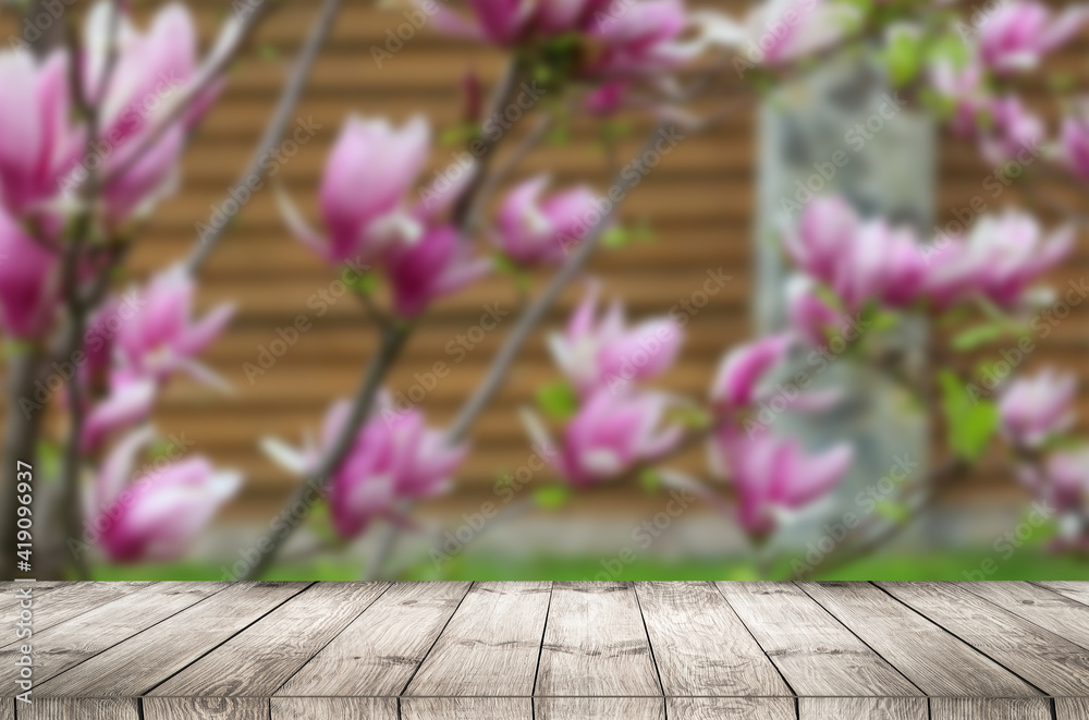Empty top wooden table and flower blurred background. Can use for product display