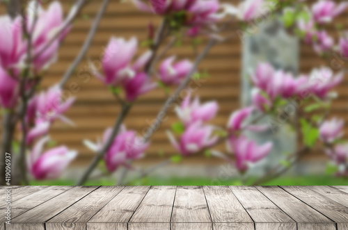 Empty top wooden table and flower blurred background. Can use for product display © Angelov