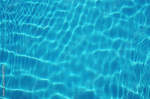 Summer blue swiming pool water background