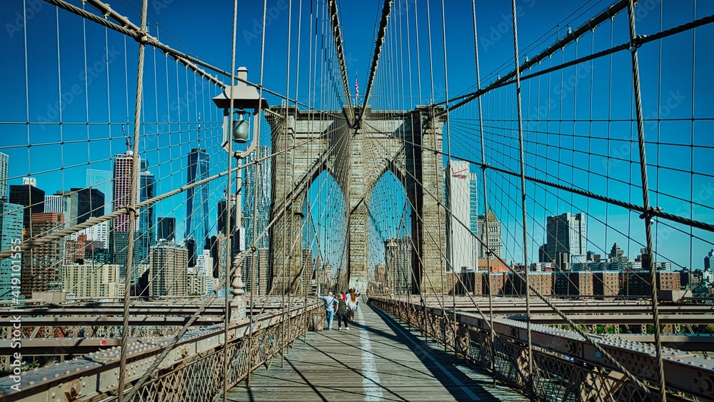 Fototapeta premium Brooklyn Bridge at morning, skyscrapers of Manhattan on background